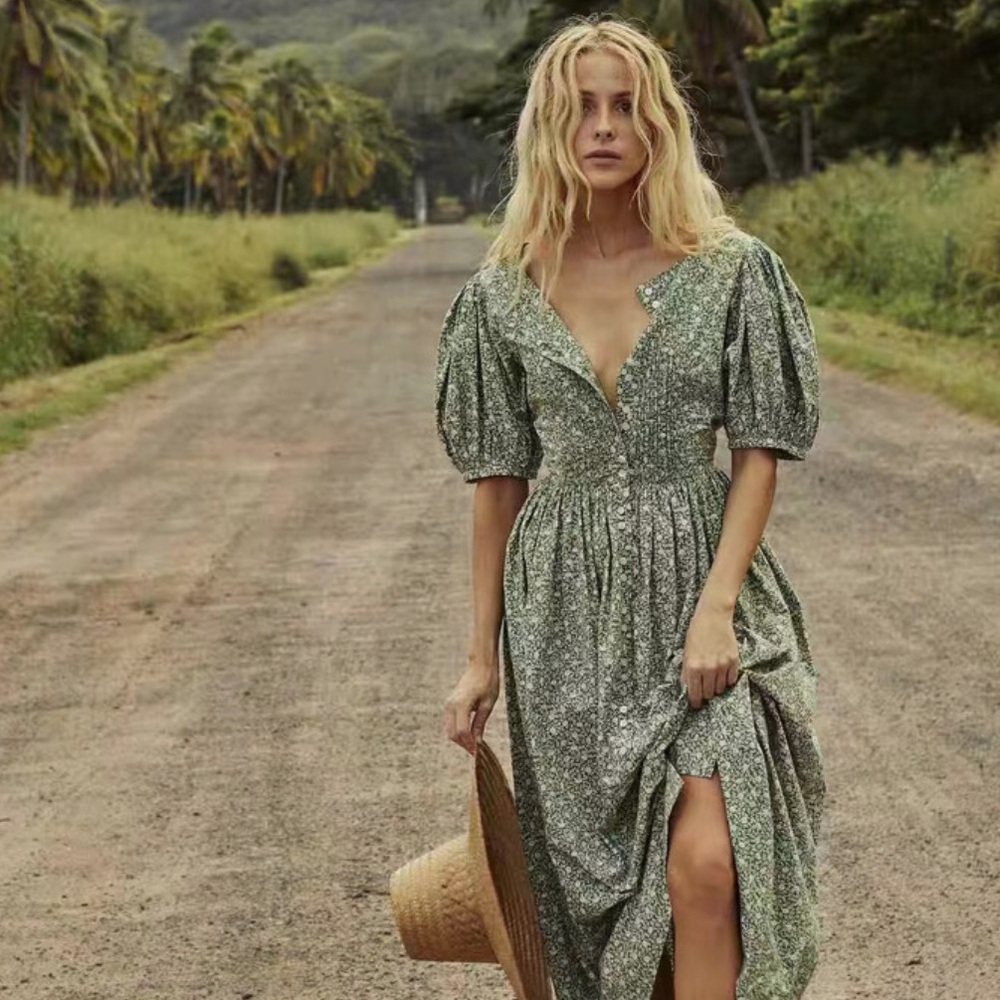 DÔEN vintage inspired puffed sleeved long dress wi the buttons all the way down